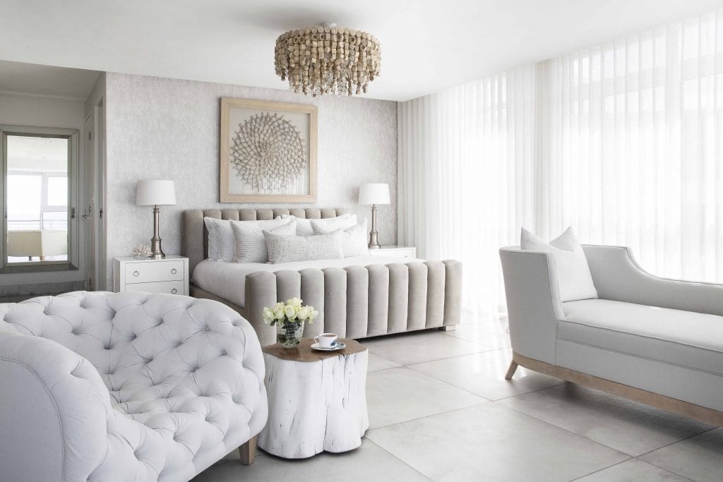 Serene retreat with soft textures and neutral bedroom colors by Decorilla designer, Ana C.