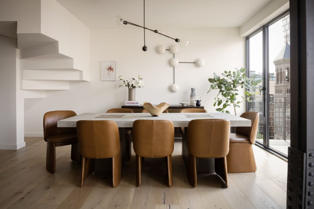 Dining room with seating in Bosc Pear Sherwin Williams color of the year accents by DECORILLA designer Jonathan K