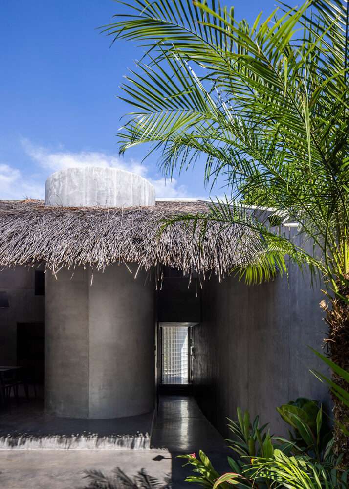 timber waffle roof shields constellation of living spaces in vietnamese residence by kientruc o