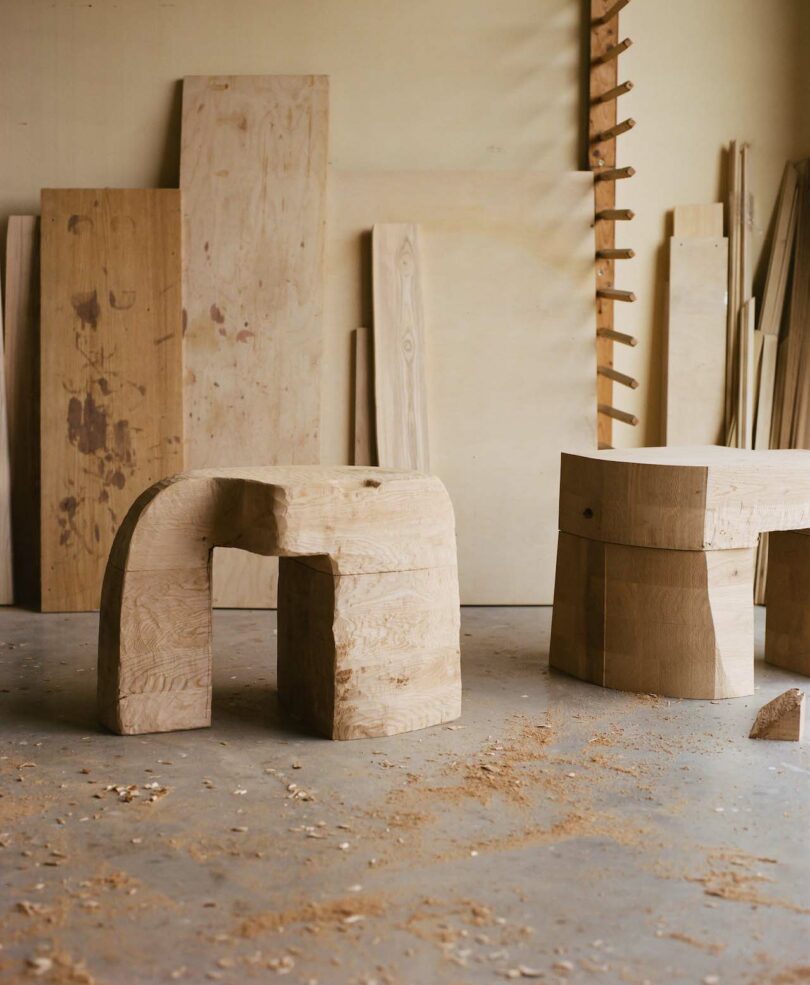 Wooden table with an irregular, natural shape in a workshop. 