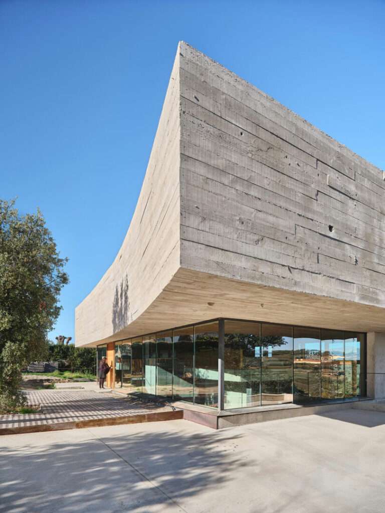 Oak House Is a Concrete and Glass Home With Floating Levels