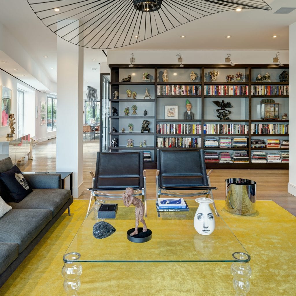 Bookshelf wealth in a living room by Decorilla designer, Susan W.