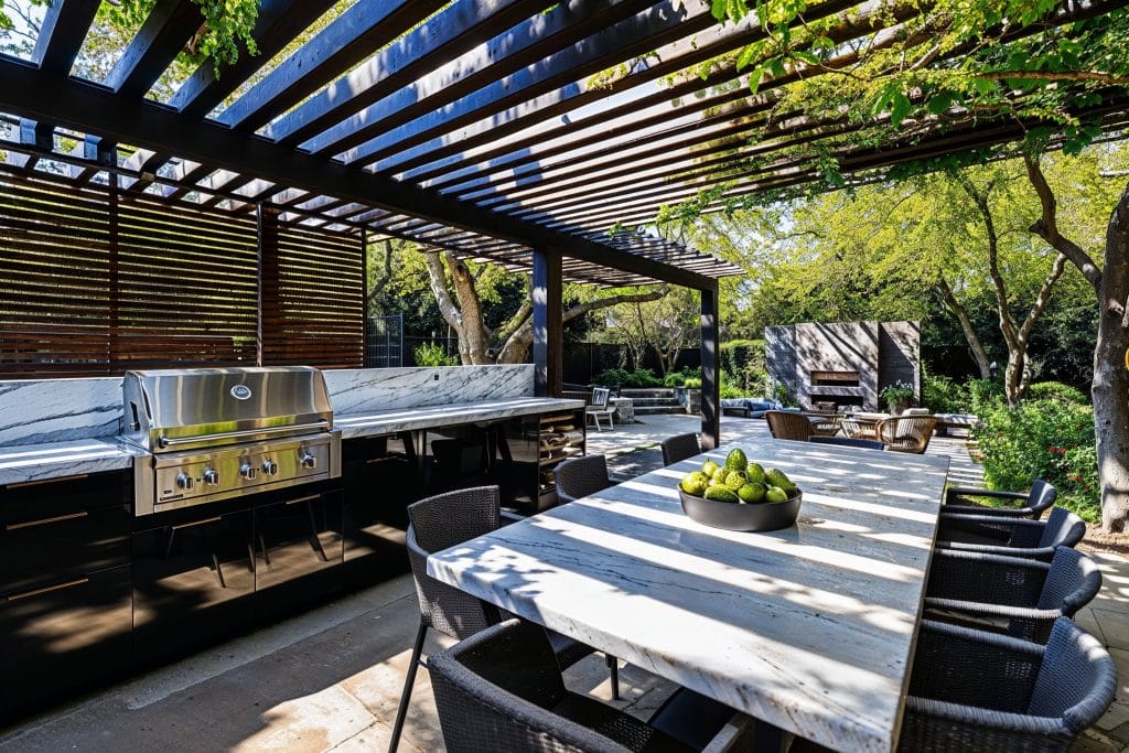 Outdoor kitchen by Decorilla featuring the best patio dining furniture