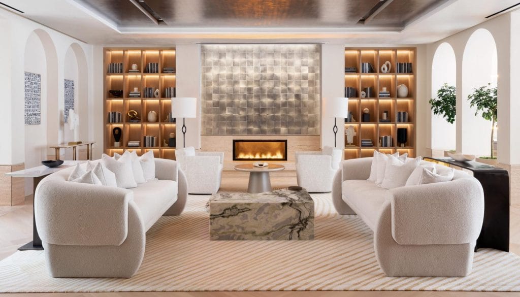 Modern living room metallic accent wall by DECORILLA designer Molly I
