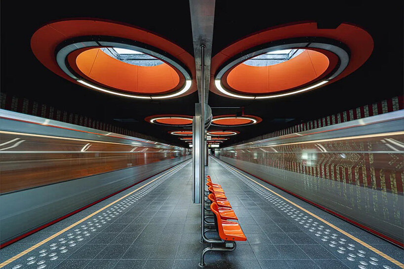 european metro stations unfold as mirrored worlds of calm in thibault drutel's photo series