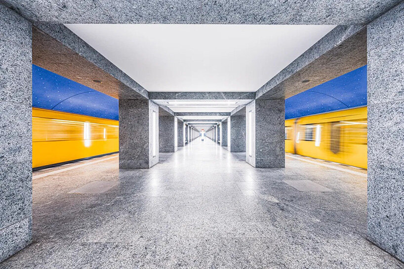 european metro stations unfold as mirrored worlds of calm in thibault drutel's photo series
