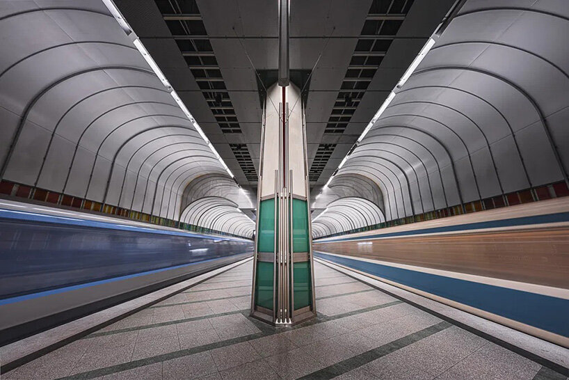 european metro stations unfold as mirrored worlds of calm in thibault drutel's photo series