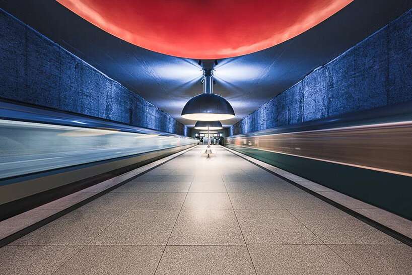 european metro stations unfold as mirrored worlds of calm in thibault drutel's photo series