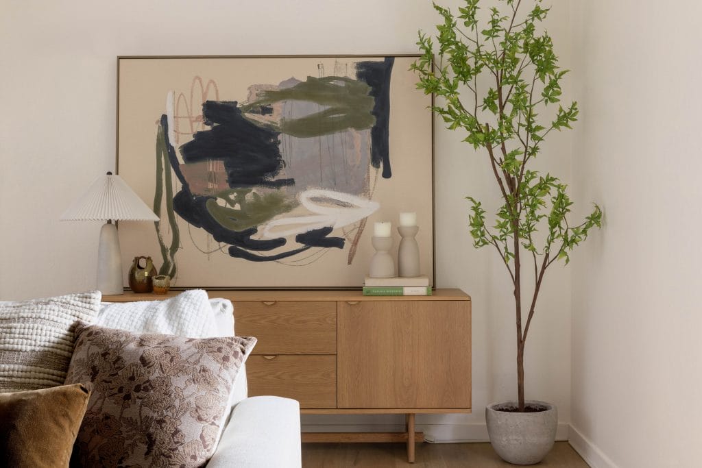 Modern apartment decor ideas in a living room by Decorilla designer, Megan W.