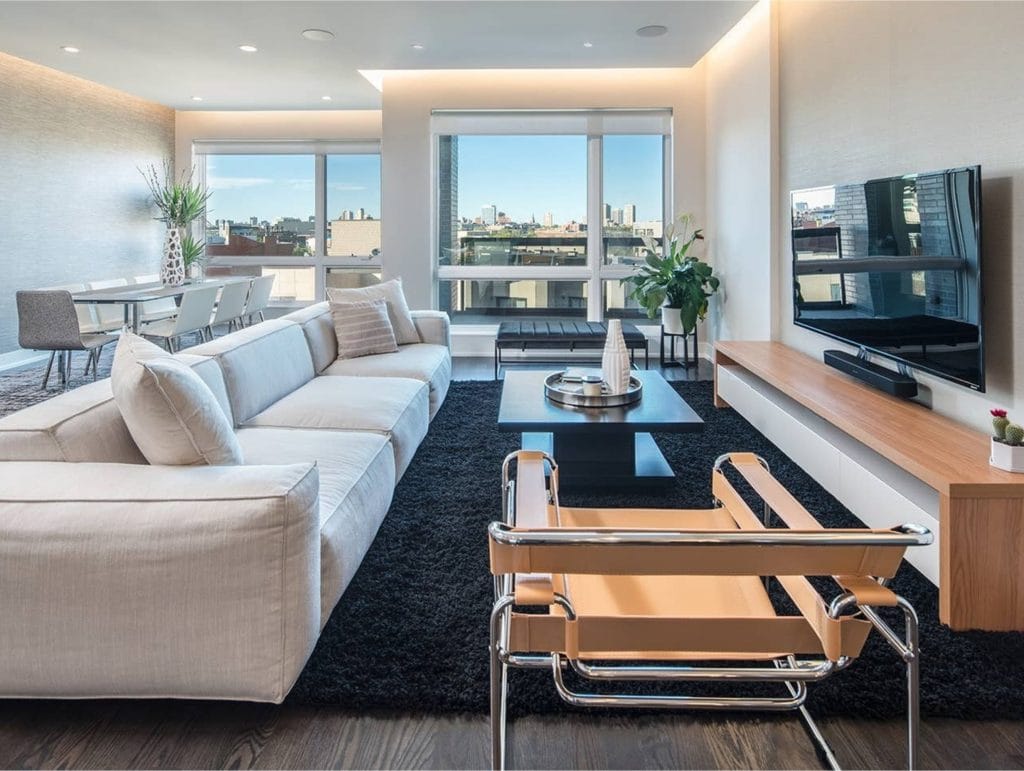 Modern apartment decor in a living room by Decorilla designer, Matthew J.