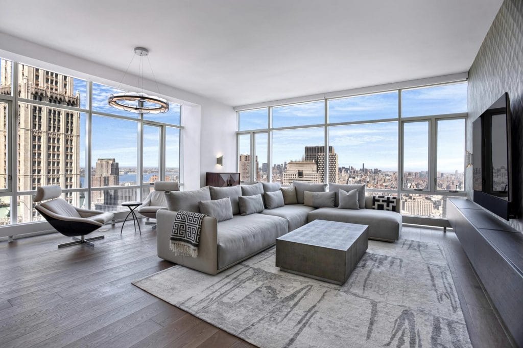 Modern apartment decor ideas in a living room by Decorilla designer, Joyce T.