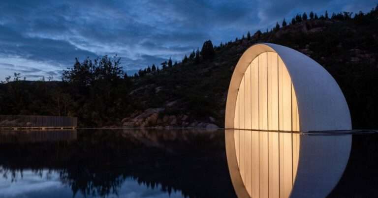 Striking Architectural “Moon” Nestled Into the Mountains of China