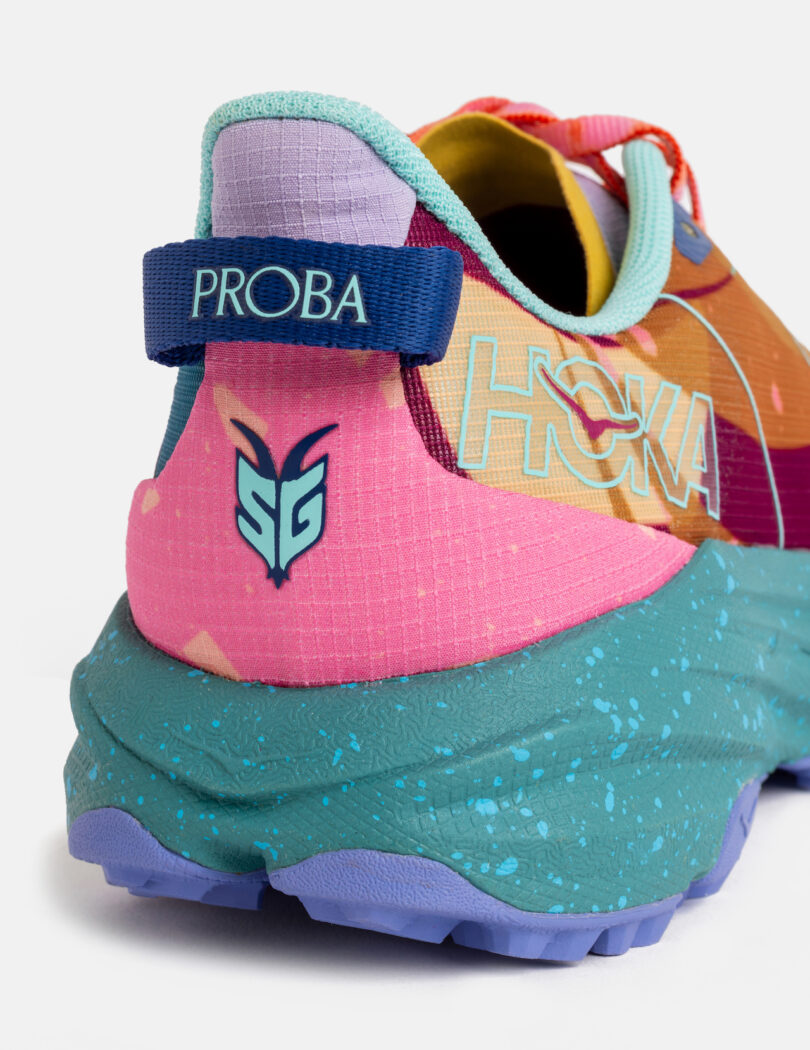 Close-up of the heel of a multicolored HOKA running shoe with