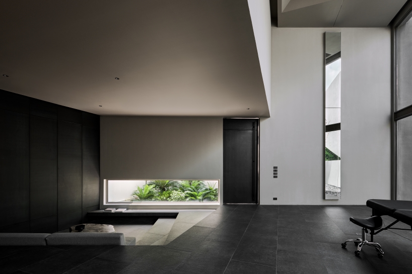 tattoo atelier and residence merge within angular casa T sculpted by SSAA in bangkok