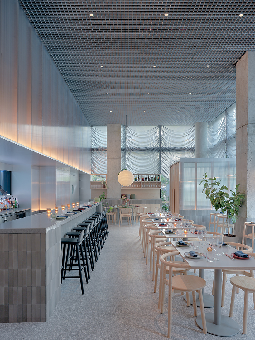 translucent curtains drape over polycarbonate walls at nin hao restaurant in brooklyn