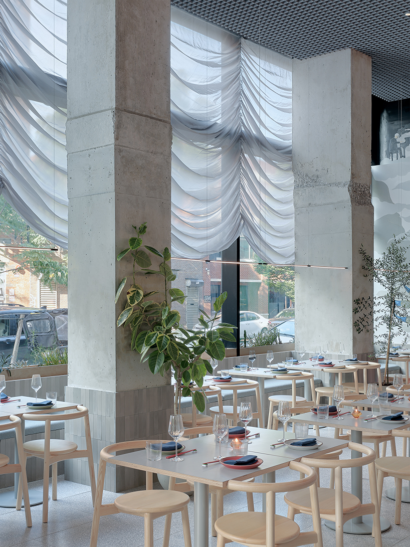 translucent curtains drape over polycarbonate walls at nin hao restaurant in brooklyn