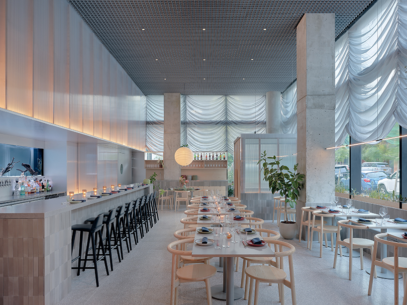 translucent curtains drape over polycarbonate walls at nin hao restaurant in brooklyn