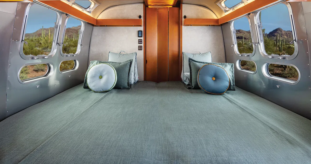 King bed in Frank Lloyd Wright Usonian Travel Trailer with Airstream