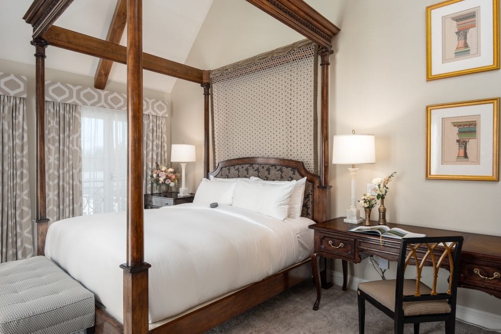 A calm space built with relaxing bedroom colors by Decorilla designer, Natasha S. 