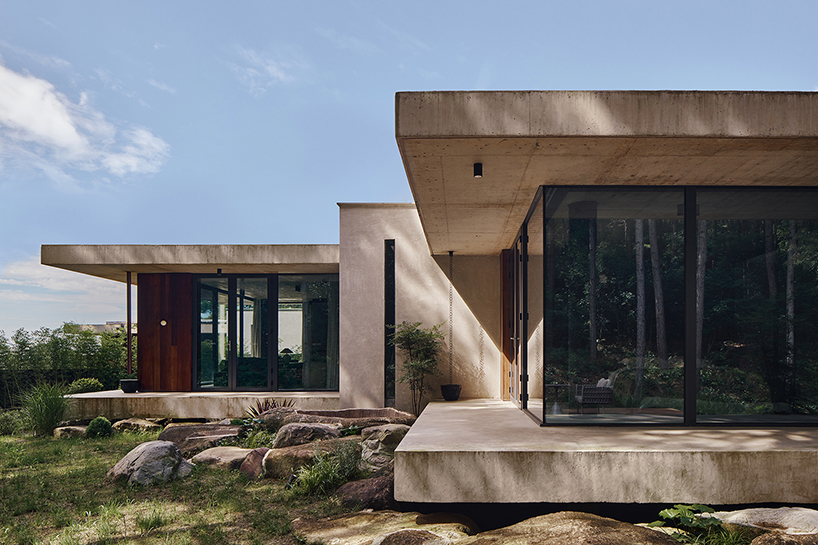 studio8's resort villas nestle amid pine forests and bamboo mountains in china