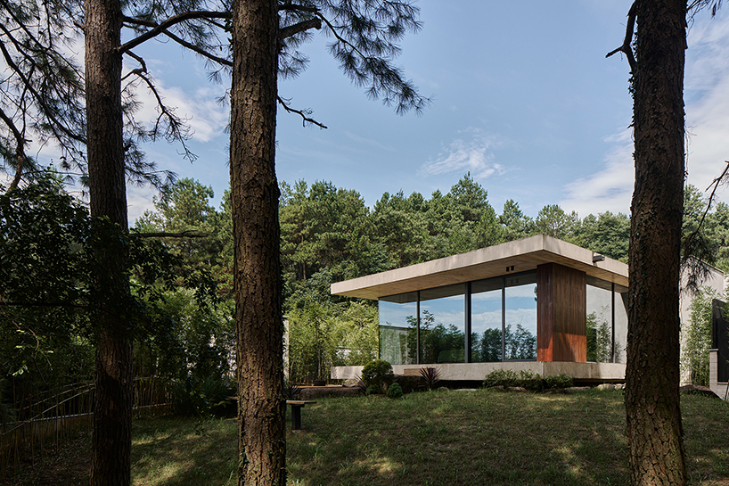 studio8's resort villas nestle amid pine forests and bamboo mountains in china