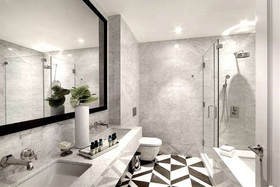 Classic tile drenching trend by Decorilla designer, Joseph G. 