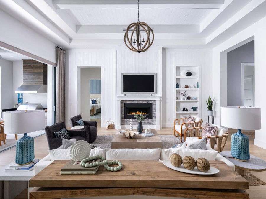 Living room layouts with a fireplace by Decorilla designer, Berkeley H.