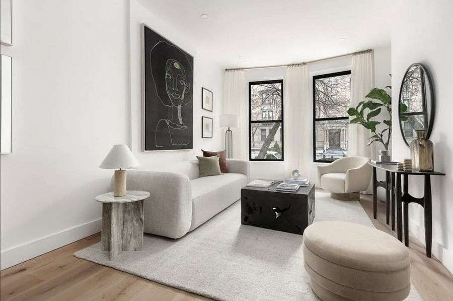 Natural home decor in a modern organic living room by Decorilla designer, Leanna S.