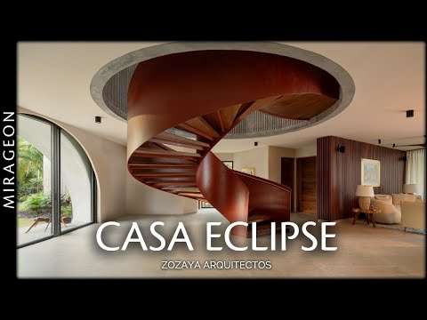 Anchored by a Sculptural Helical Staircase | Casa Eclipse
