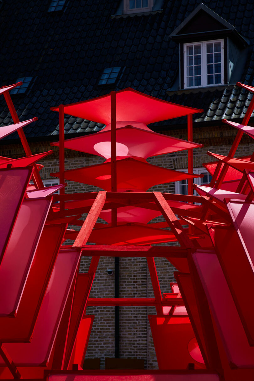 A red structure with a black background.