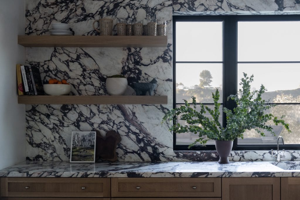 Statement marble and kitchen countertop trends 2026 in bold interiors by Decorilla designer Carly M. 