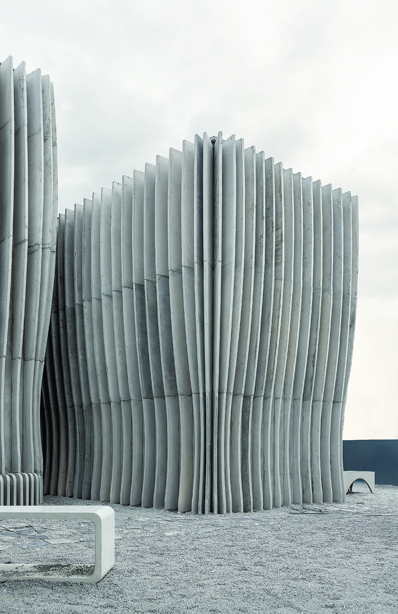 jgstudio transforms public bathroom into undulating concrete installation in ecuador