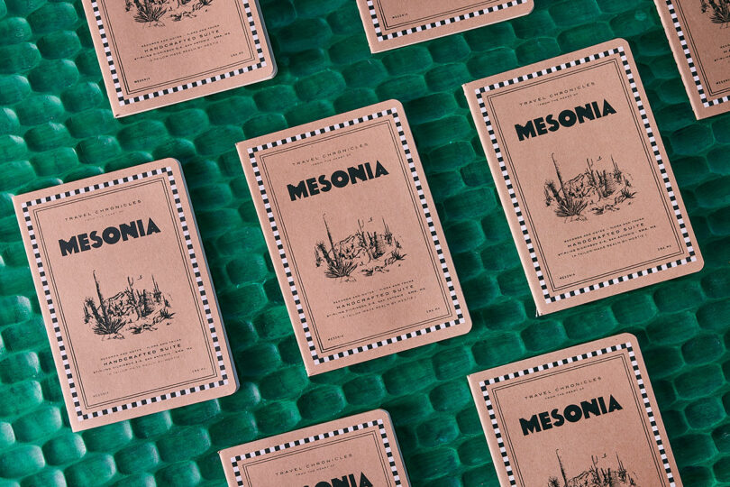 Several brown booklets labeled 