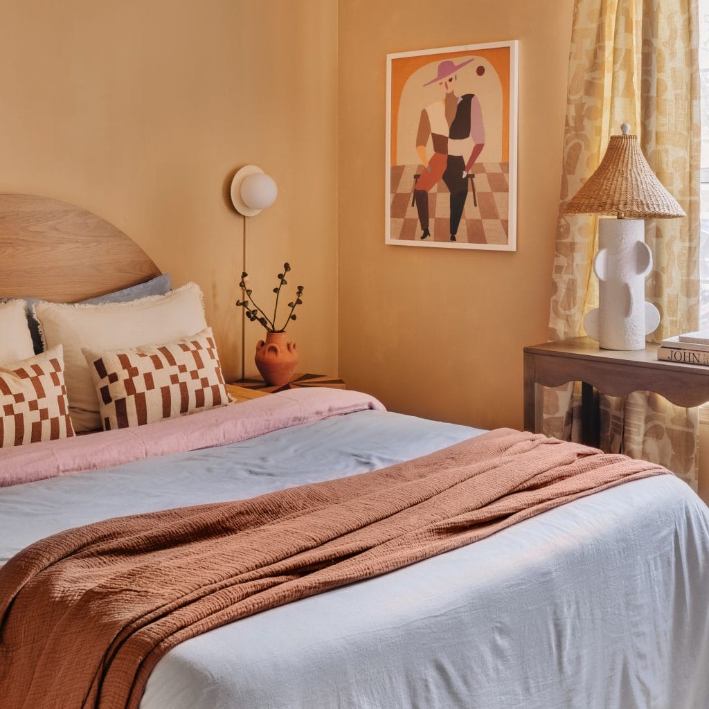 Earth-toned caramel bedroom by Decorilla designer, Maja E.