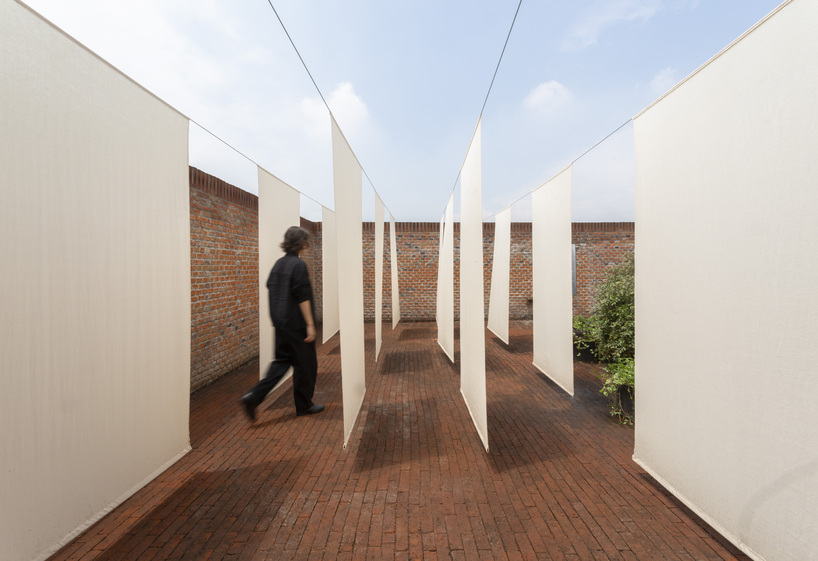 tendedero reframes housework through large-scale fabric installation in mexico city