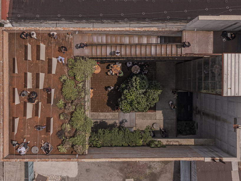 tendedero reframes housework through large-scale fabric installation in mexico city