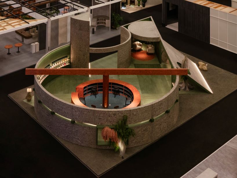 circular timber pavilion with voids and slits displays variety of veneer textures and finishes
