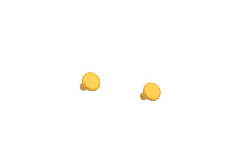 Four yellow wall knobs are arranged diagonally from the bottom left to the top right on a white background