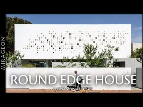 Perforated Concrete Façade for a Discreet and Powerful Presence | Round Edge House