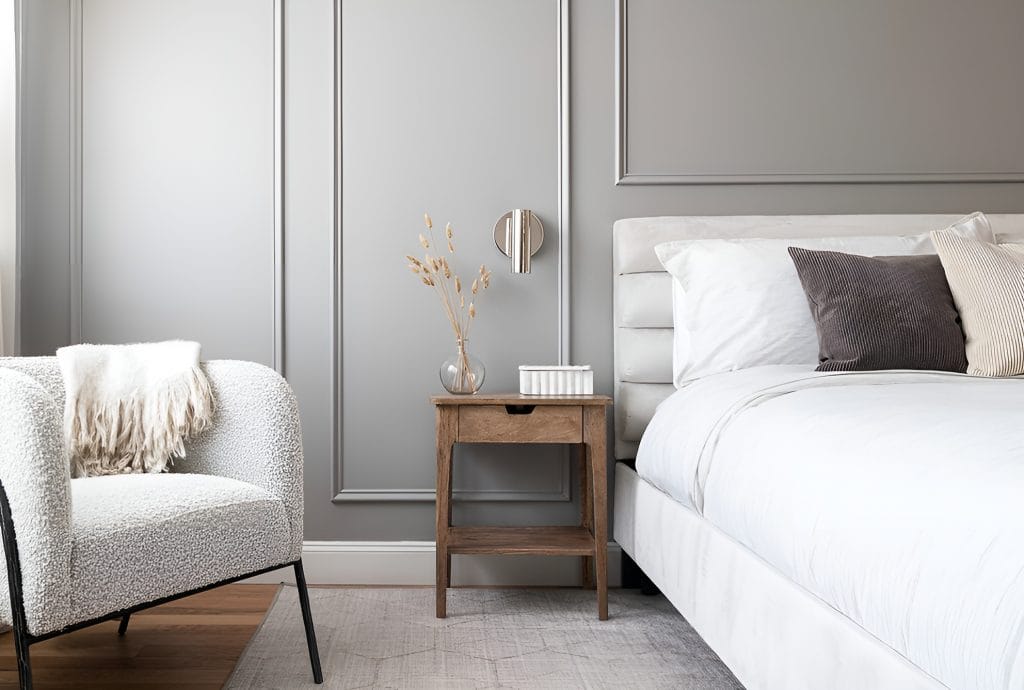 Elegant masculine bedroom interior design by Decorilla designer, Cristiane P.