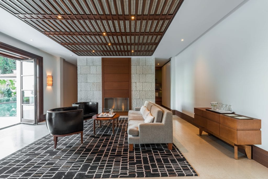 Modern masculine interior design of a living room by Decorilla designer, Amelia R.