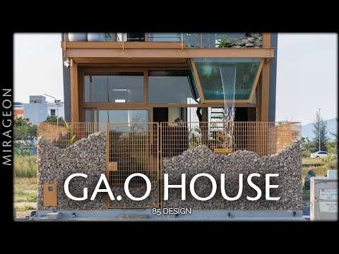 Waterfall And Fish Tank In A Flexible Living And Working Space | Ga.o House