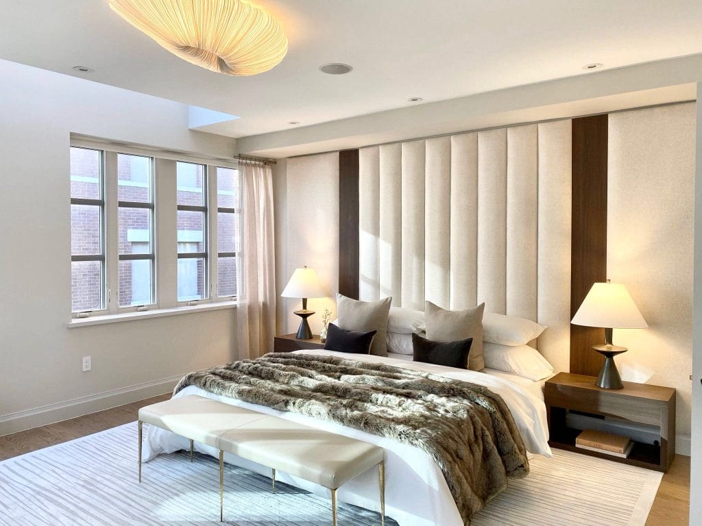 Winter decorating ideas with fur throw in a bedroom by Decorilla designer, Chanelle M.