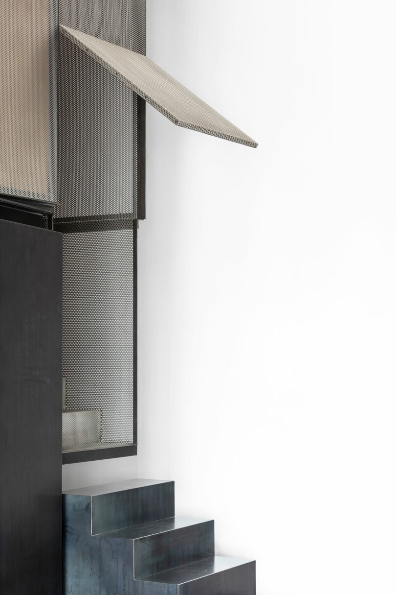 angled shot of bottom part of staircase to mezzanine