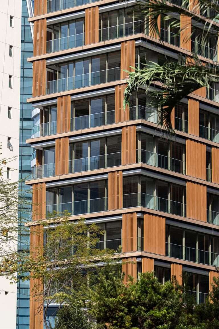 kinetic wooden panels run across residential tower’s facade by perkins&will in são paulo