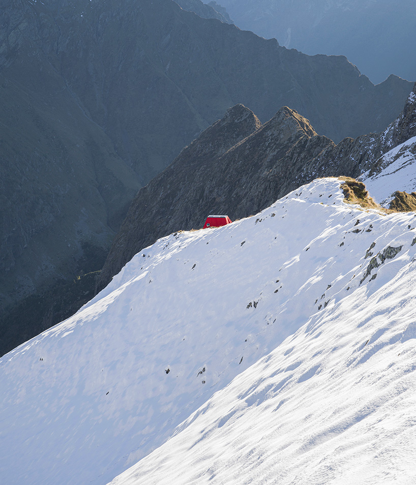 red bivouac shelter in the alps becomes high-altitude base for bergamo's modern art gallery