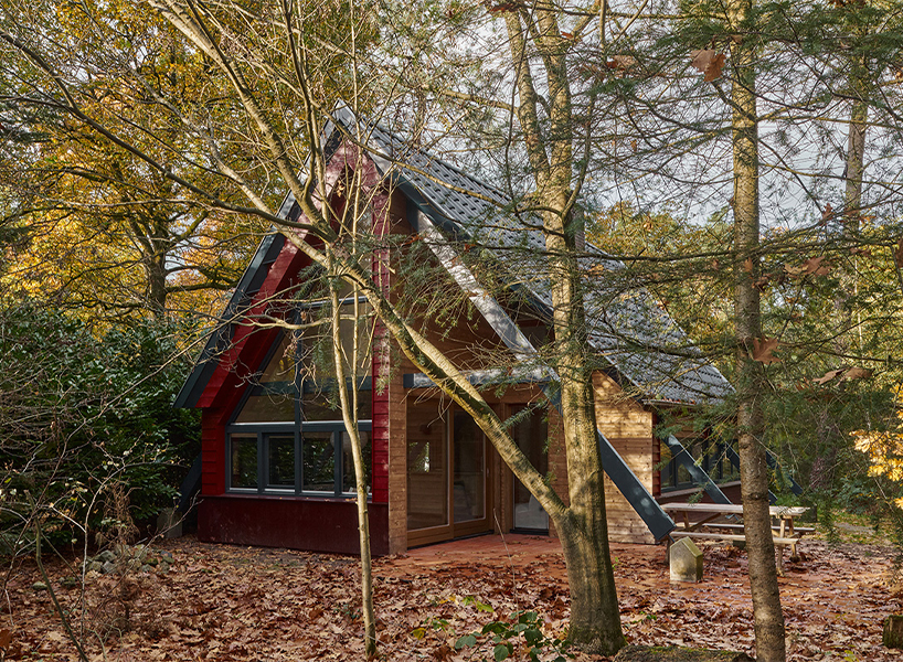 diagonally cut A-frame roof revives dutch holiday home by kumiki