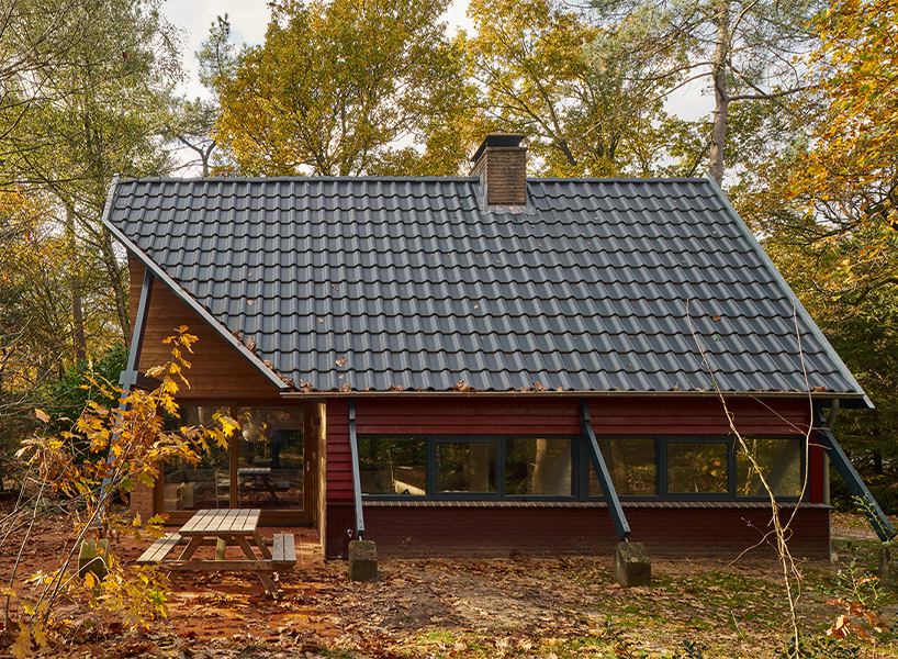 diagonally cut A-frame roof revives dutch holiday home by kumiki