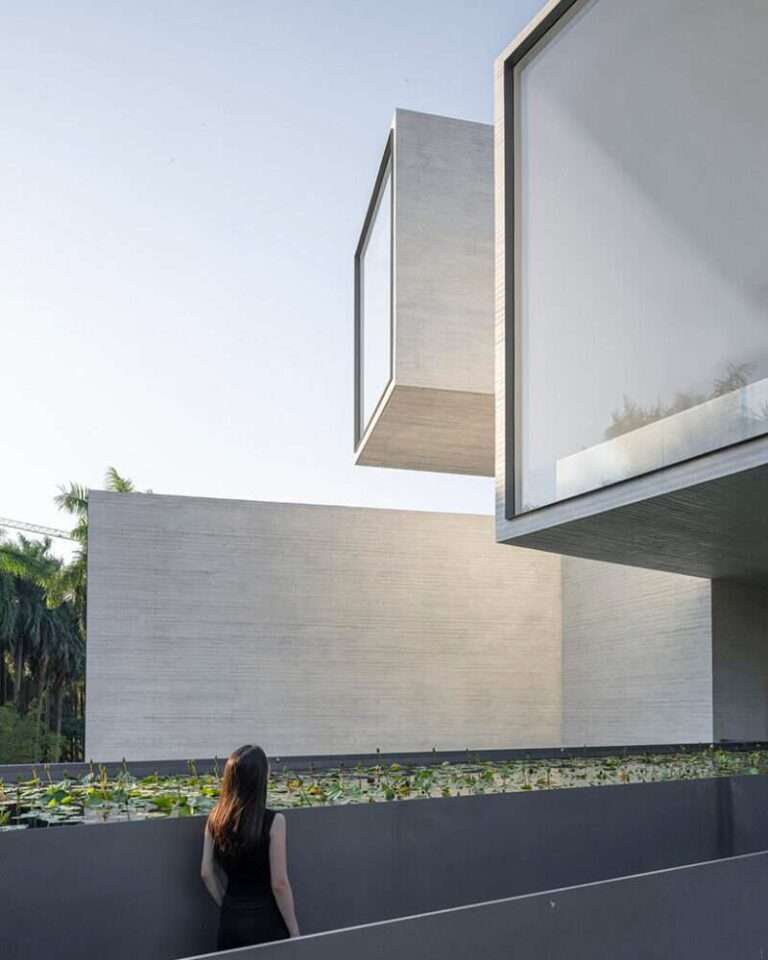 link-arc shapes shunde museum as stack of rotating tubes to frame wetland views