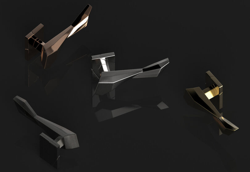 Four modern, angular door handles in different metallic finishes—copper, silver, black, and gold—are displayed against a dark background.